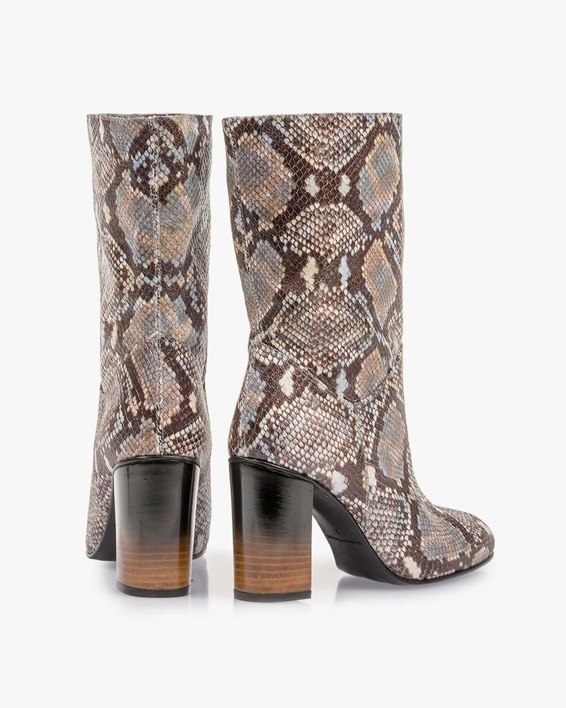 Brown and white leather boots with snake print
