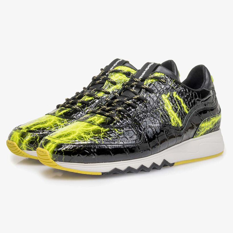 Black patent leather sneaker with yellow print