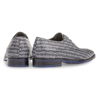 Grey lace shoe with a black graphic print