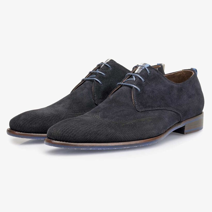 Dark blue suede leather lace shoe with a laser-cut pattern