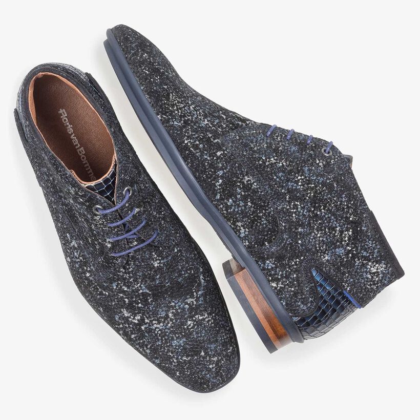 Dark blue leather lace shoe with an organic texture