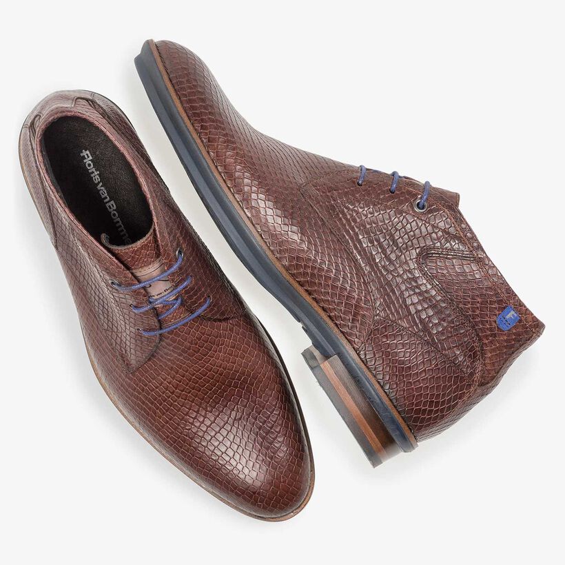 Cognac-coloured leather lace shoe with snake print