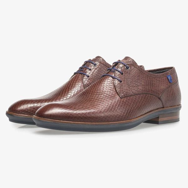 Leren veterschoen met snakeprint cognac